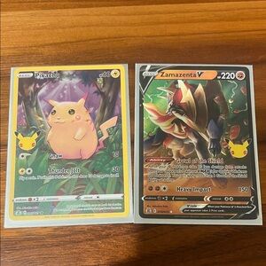 Pikachu and Zamazenta V Cards In Case